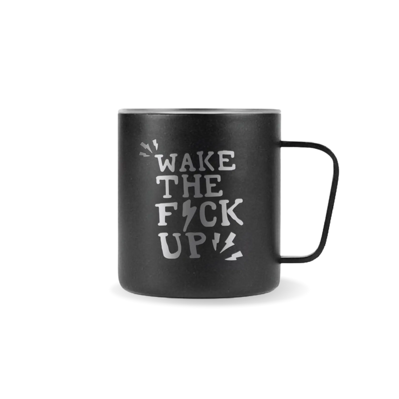 A black metal mug with the text 'WAKE THE F*** UP' printed on the side, featuring a handle and a press-fit lid.