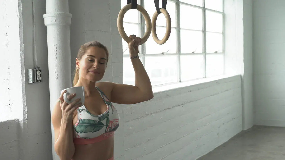 Woman working out looking at cellphone