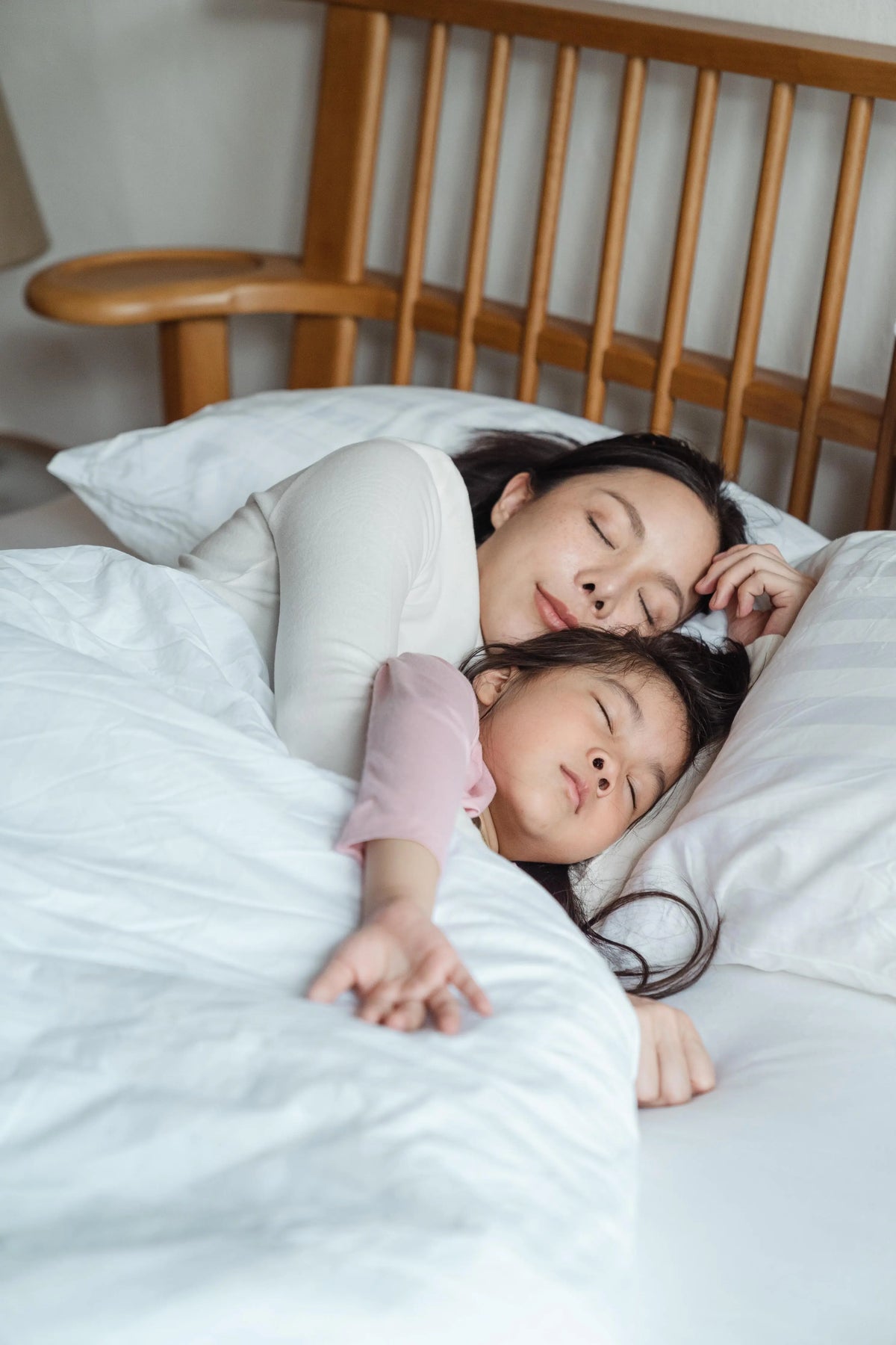 Mom and daughter sleeping