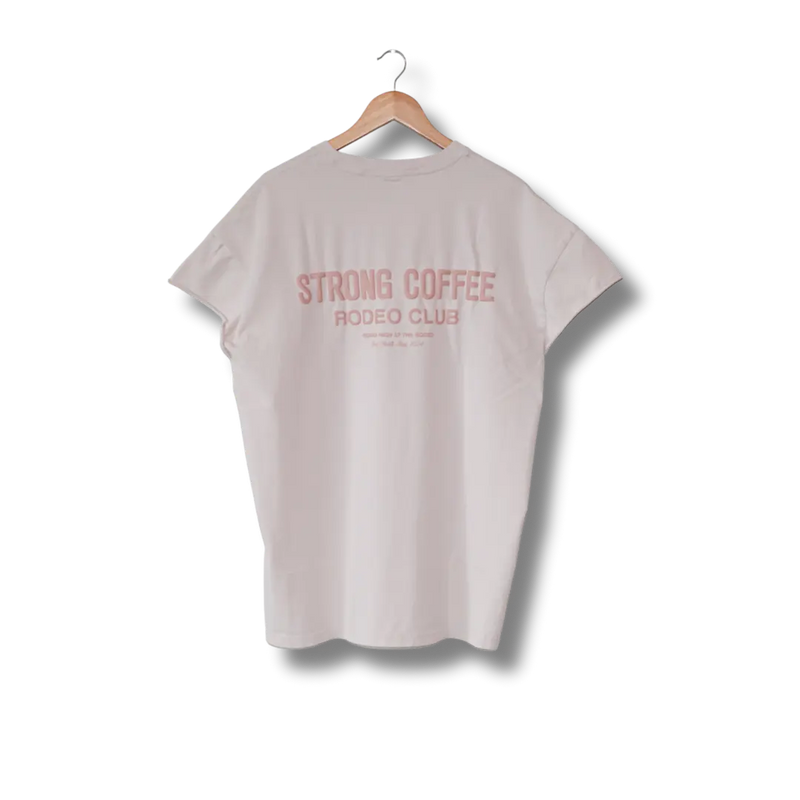 A sleeveless white t-shirt with text 'STRONG COFFEE RODEO CLUB' printed on the back, displayed on a hanger.